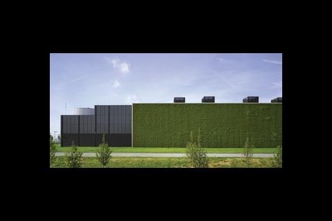 The green wall on the northeast elevation and extensive landscaping help to reduce the building’s visual impact